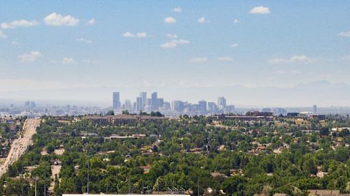 a view of the city from the top of a skyscraper