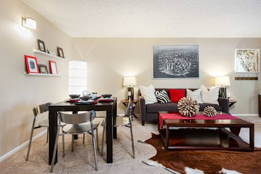 our apartments offer a living room and dining room with a table