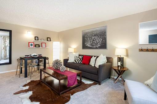 a living room with a couch and a table