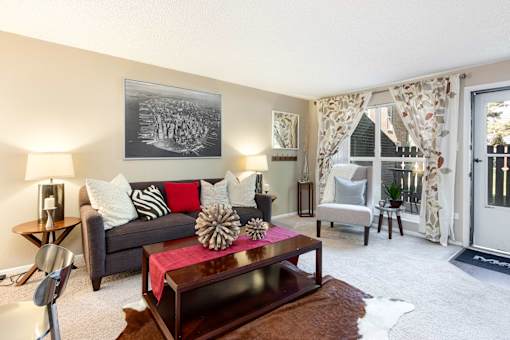a living room with a couch and a coffee table