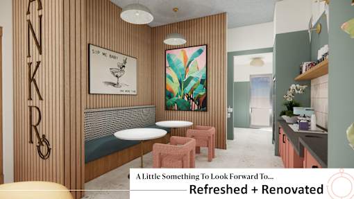 A room with a wooden wall and a painting of a plant.