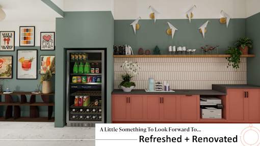 A cafe with a vending machine and a counter.