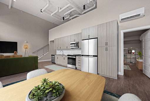 A modern kitchen with a wooden table and a bowl of plants on it.