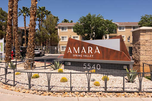 the sign spring valley at the entrance of the building