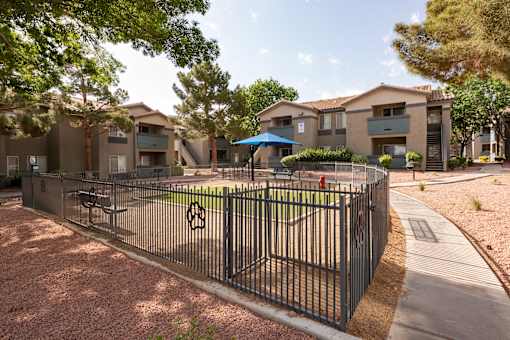 our apartments have a fenced in yard with a basketball court