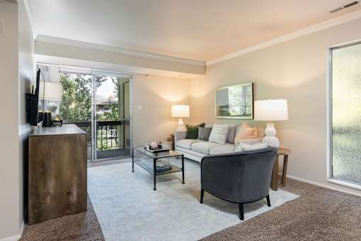 a living room with a couch and a chair