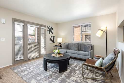 a living room with a couch and a coffee table