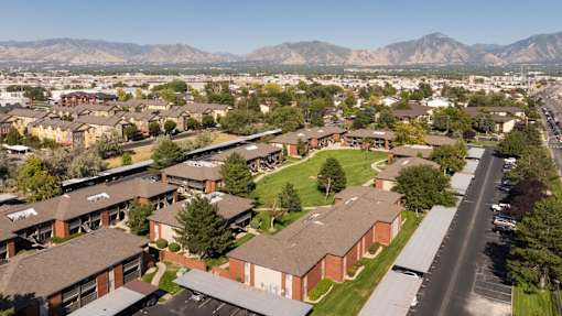an aerial view of a neighborhood of houses in a suburban area