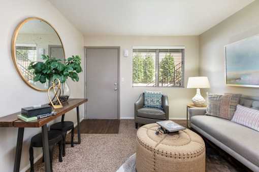 a living room with a couch and a table
