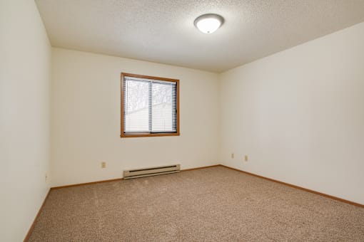 Kitchen with an island at Grayhawk Apartments, North Dakota, 58104