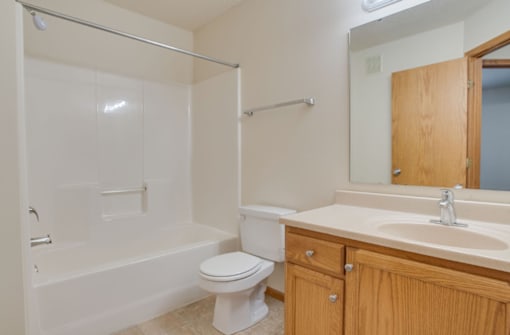 Carpeted Living Space at Royal Oaks Apartments, North Dakota, 58103