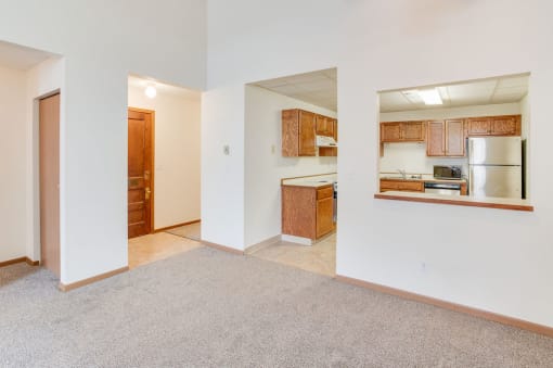 a view of the kitchen and living room from the living room