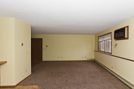 Empty living room at Jacobs Square Apartments, St. Cloud, MN