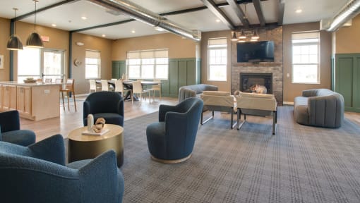 a living room with couches chairs and a fireplace and a kitchen, Pinehurst Apartments, Baxter, MN