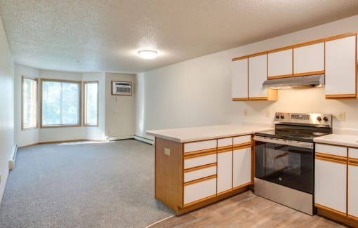 Kitchen with stainless steel appliances at Redwood Estates, Coon Rapids, Minnesota, 55433