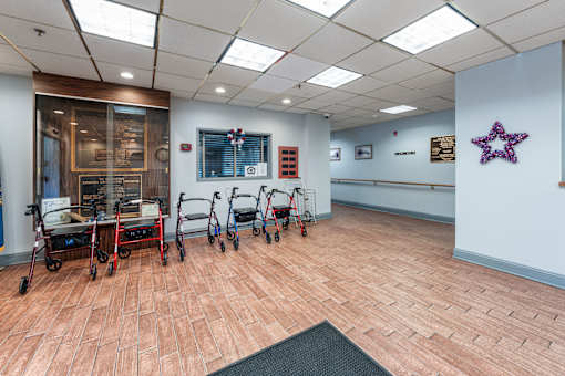 an empty room with chairs and a star on the wall