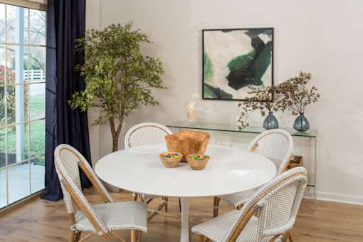 Dining area with dining table and seating at Westridge Gardens