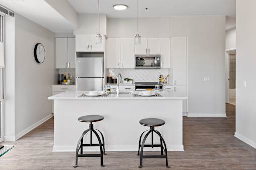 Fitted Kitchen With Island Dining at 23rd Place Apartments, Chicago, Illinois