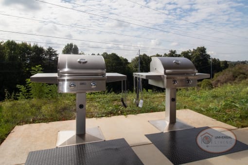 A grilling station with stainless steel grills.