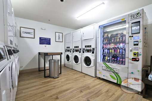 The on-site laundry center for residents with washers, dryers, and seating.