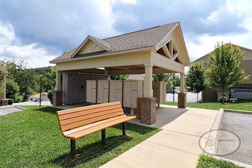 The outdoor mail center with bench seating.
