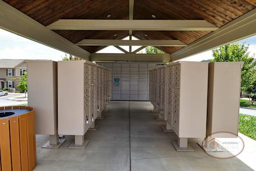 A close up view of the mailboxes and Amazon package Hub.