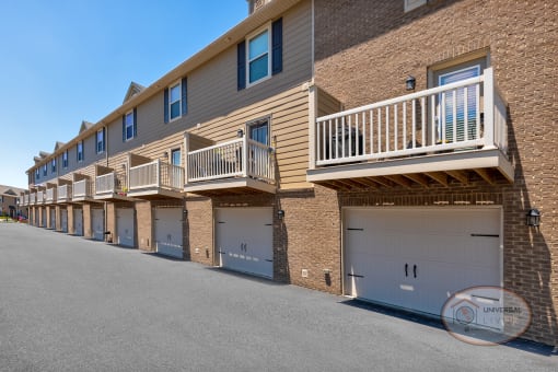 a building with a row of garages on the side of it