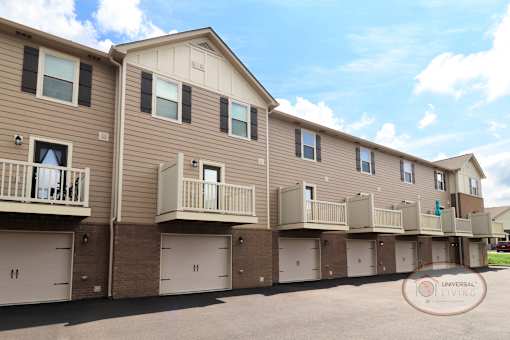A close up of a garage and balcony on one of the two and three bedroom apartment homes.