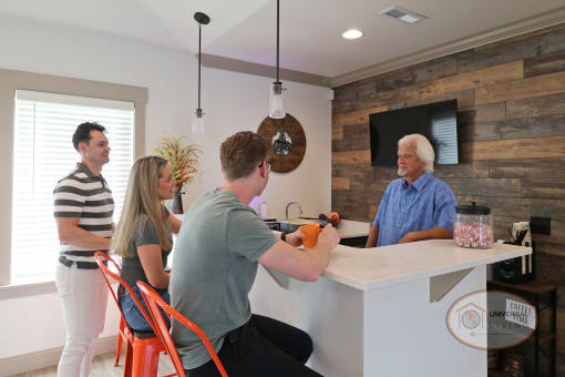 A group of people relaxing at the coffee bar.