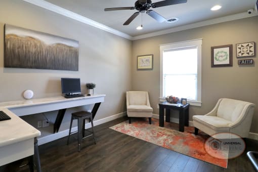 The business center with lounge seating, free Wi-Fi and computers.