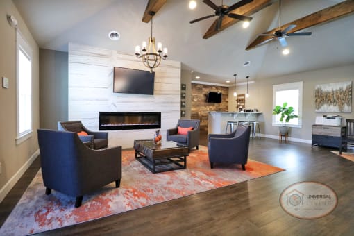 The clubhouse lounge, complete with coffee bar, fireplace, flat screen TV, and lounge area.