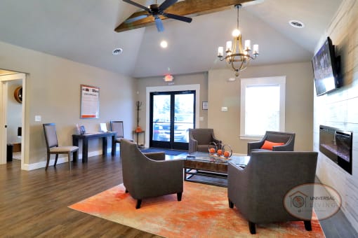 The clubhouse lounge, complete with coffee bar, fireplace, flat screen TV, and lounge area.