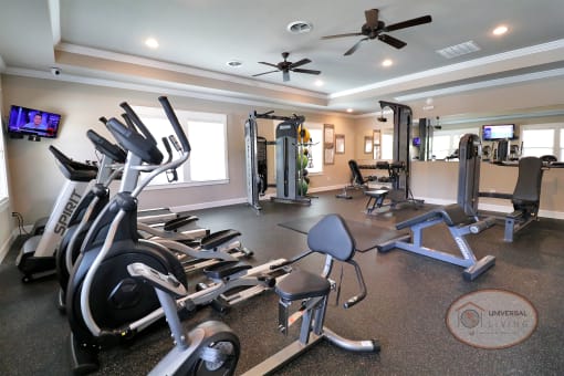 A fitness center with weight training and cardio equipment.