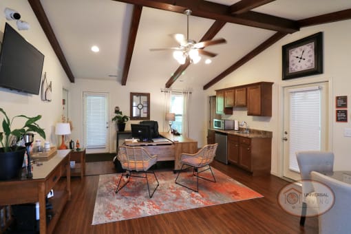 The clubhouse lounge with seating and TV.