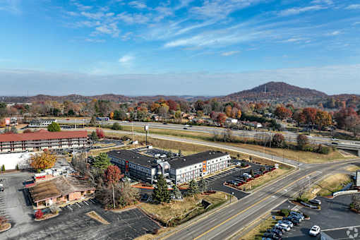 An aerial view of The Hub at Mountcastle with mountains in the background.