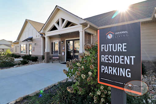 a future resident parking sign in front of a house