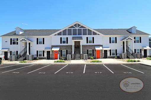 The front of a one bedroom stacked apartment home.