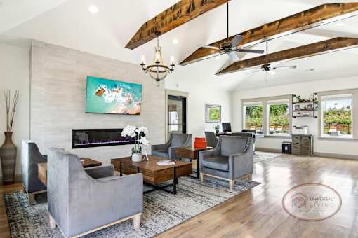The clubhouse lounge, complete with coffee bar, fireplace, flat screen TV, and lounge area.