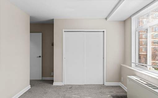 Bright room with closet and natural light at Dominion Towers Apartments, Arlington, 22204