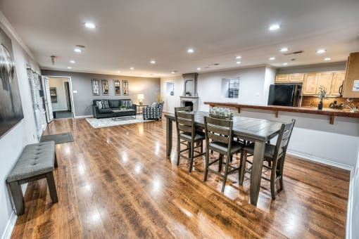Open concept living space with hardwood flooring at Le Montreaux Apartments, Austin, 78759