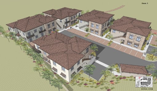 an aerial view of a row of houses with brown tile roofs