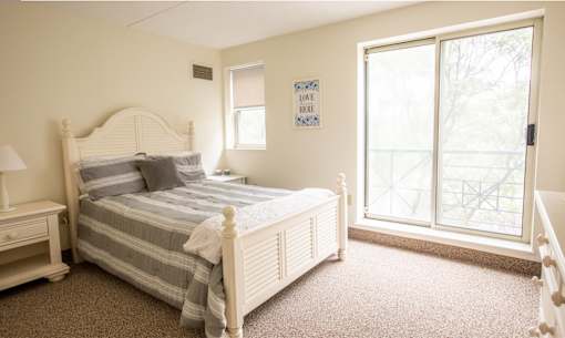 Large bedroom with  huge windows