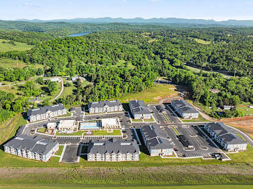 Aerial view of apartment community with pool and parking at Ardmore at Prosperity Apartments, Knoxville, 37932