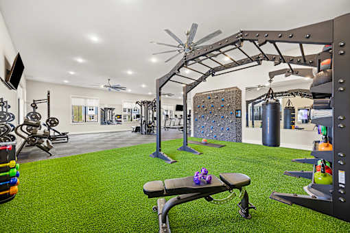 Spacious fitness center with turf training area at Ardmore at Prosperity Apartments, Knoxville