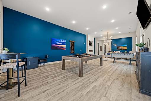 Game room with foosball and pool tables at Ardmore at Prosperity Apartments, Knoxville, TN 37932