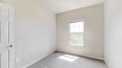 an empty room with a window in it