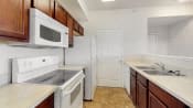 a kitchen with a sink and a microwave
