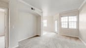 a white room with a rainbow in the ceiling