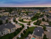 an aerial view of a suburb of a city with houses