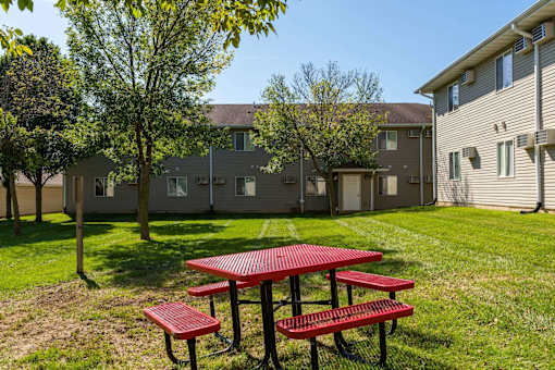 our apartments have a picnic area in the grass